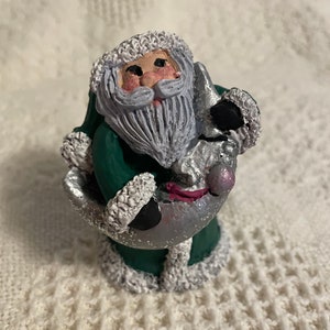 Hand painted ceramic Santa Claus Figurine