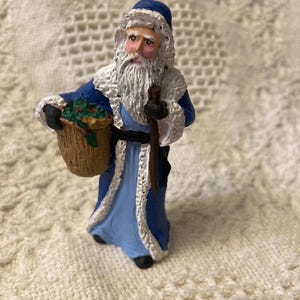 Hand painted ceramic small Santa Claus Figurine