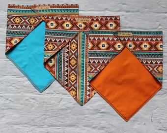 Bandana dog scarf in ethnic pattern. In brown, orange and turquoise tones. Various cuts and color combinations. Various sizes