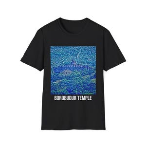 May include: Black t-shirt featuring a blue and green image of the Borobudur Temple in Indonesia. The text "BOROBUDUR TEMPLE" is printed below the image.