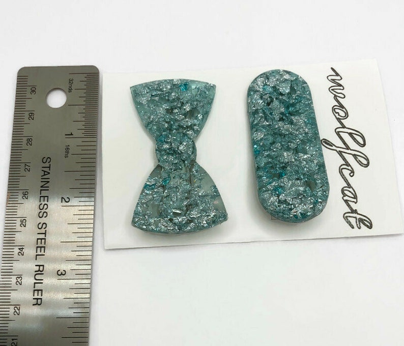 Clear teal and silver foil oval and bow 2 inch resin hair barrette set Oval hair clip Bow tie hair clip 2\u201d resin hair clip