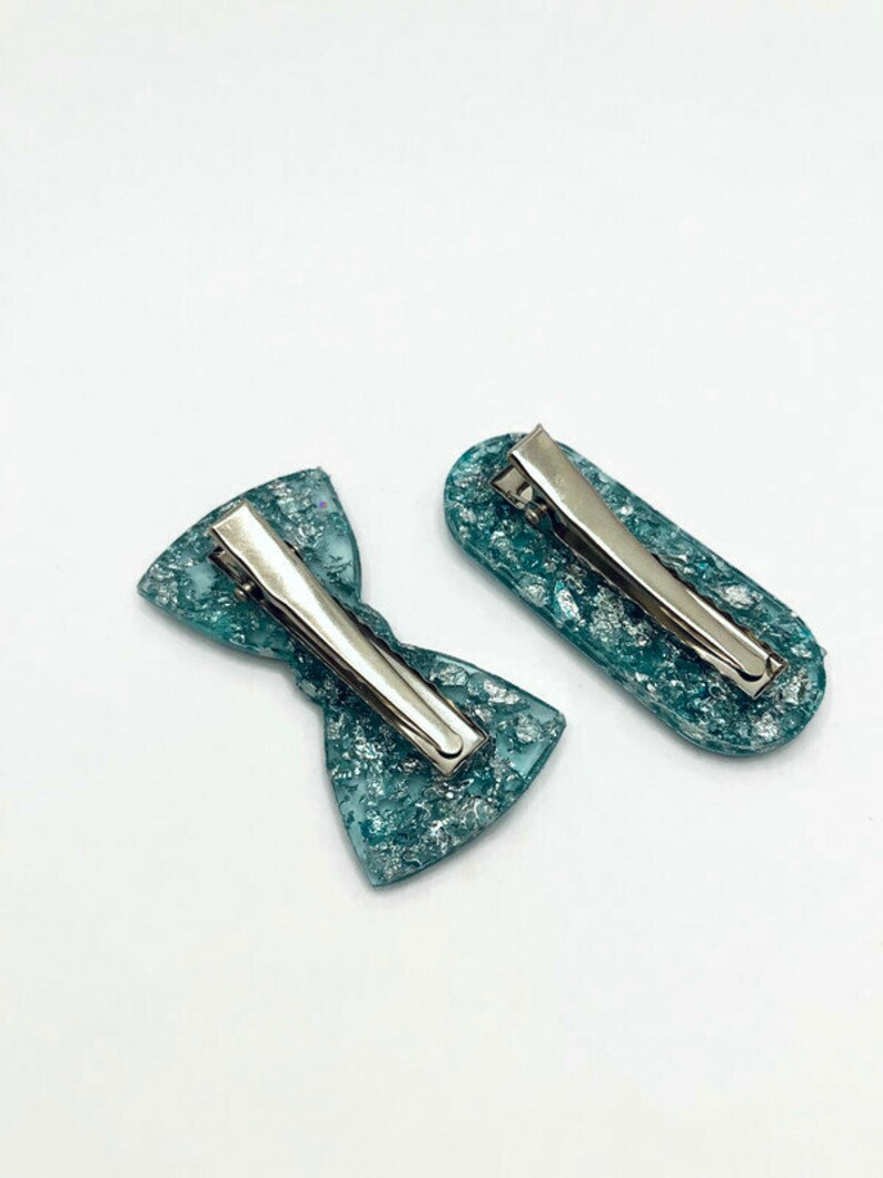 Clear teal and silver foil oval and bow 2 inch resin hair barrette set Oval hair clip Bow tie hair clip 2\u201d resin hair clip
