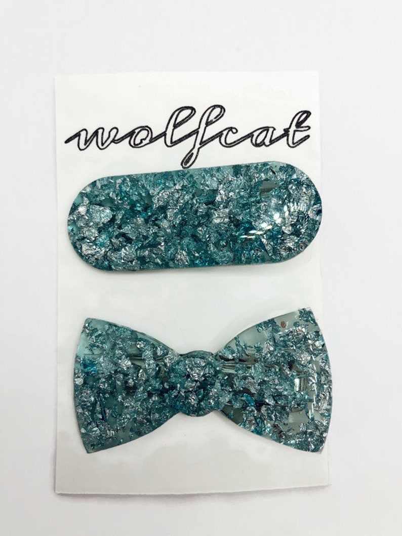 Clear teal and silver foil oval and bow 2 inch resin hair barrette set Oval hair clip Bow tie hair clip 2\u201d resin hair clip