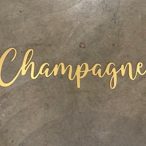 Metal Champagne Word Sign: Elegant Home Bar Decor