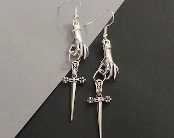 Silver hand with sword dangling earrings, sword dangle earrings,  gothic earrings, hypoallergenic and nickel free backs of your choice