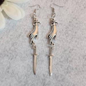 Long Silver hand with knife dangling earrings, knife dangle earrings,  gothic earrings, hypoallergenic and nickel free backs of your choice