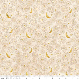 May include: Cream-colored fabric with a repeating pattern of gold moons, stars, and dotted spiral circles. The design includes crescent moons with smiling faces and five-pointed stars, creating a whimsical, celestial theme. The fabric is marked with inches.