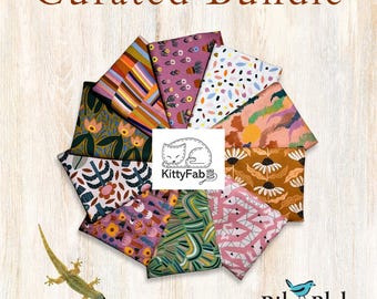 May include: A curated bundle of ten folded fabric squares arranged in a circular fan pattern. The fabrics feature various colorful patterns including floral, striped, and geometric designs. A white square logo with a cat illustration and the text KittyFab is centered. The text Curated Bundle appears at the top, and the Riley Blake Designs logo with a blue bird is at the bottom right. A small green lizard is visible in the bottom left corner.