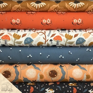 May include: A stack of fabric rolls with various nature-themed patterns. Designs include sunflowers, daisies, mushrooms, and rabbits in shades of brown, orange, blue, and white. The fabric is likely cotton or a similar material, suitable for quilting or crafting.