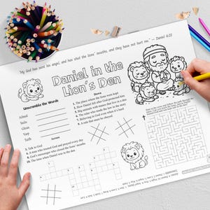 May include: Black and white activity sheet titled "Daniel in the Lion's Den" with illustrations of lions and Daniel. Includes word unscramble, crossword, and maze puzzles. Colored pencils and crayons are visible.