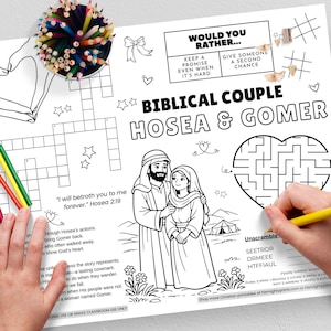 May include: Black and white coloring page featuring the text "BIBLICAL COUPLE HOSEA & GOMER". Includes a maze, crossword puzzle, and the quote "I will betroth you to me forever." A pencil is drawing on the page.