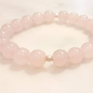 Natural Rose Quartz 6/4mm stretch bracelet, with sterling silver detailing