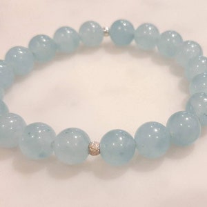Natural Aquamarine 8/6/4mm stretch bracelet, with sterling silver detailing