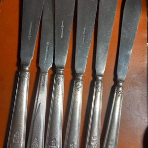 White Star Line fish knives, various. Cunard