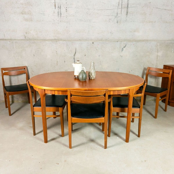 Mcintosh of Kilkady Dining Table with Four Nathan Teak and Black Leather Chairs Century Teak Extending Oval