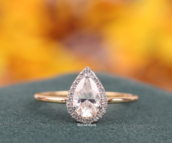 Drop shaped clearance diamond ring