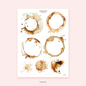 Puede incluir: Una hoja blanca con varios diseños de manchas de café en tonos marrones. Las manchas incluyen formas de anillo y salpicaduras irregulares, con el texto "COFFEE STAINS" y "COSMICAA". El código "PS154" también es visible.
