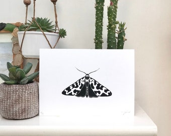 Cow print moth original lino print in black