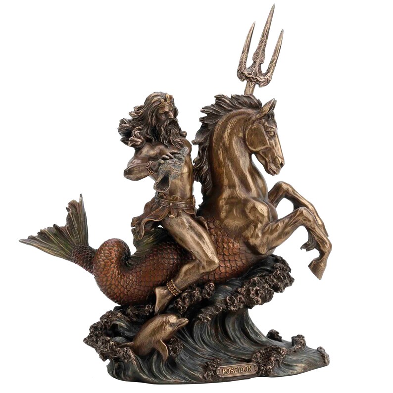 May include: Bronze sculpture of Poseidon, the Greek god of the sea, riding a seahorse with a trident in his hand. The sculpture is set on a base with waves and a dolphin.