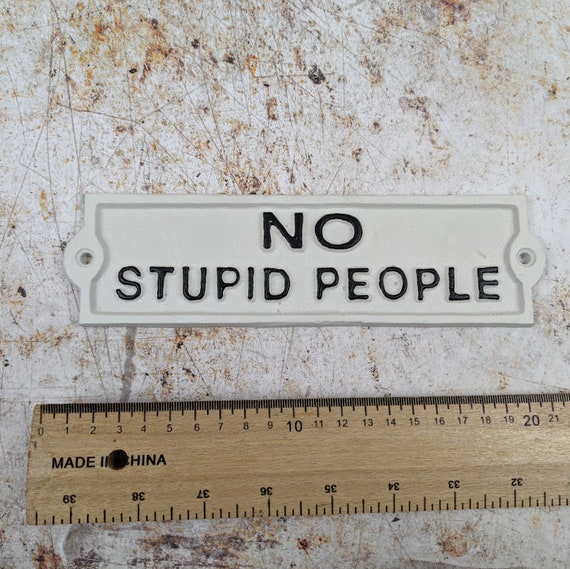 WHITE AND BLACK CAST IRON SIGN NO STUPID PEOPLE GREAT ON DOORS OR GATES 