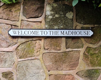 Street Sign Welcome To The Madhouse