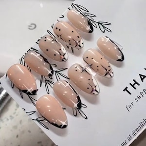 Black and White Almond Star Press On Nails