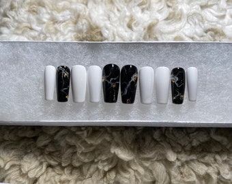 White with black marble design