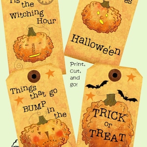 May include: Four rectangular paper tags with rounded tops and eyelets, featuring orange textured pumpkins and Halloween-themed text including 'Tis the Witching Hour', 'here comes Hallowe'en', 'Things that go BUMP in the night', and 'TRICK or TREAT'.
