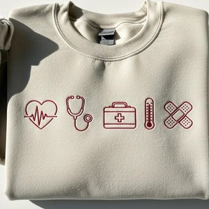 Medical Icons Embroidered Sweatshirt, Nurse Doctor Crewneck, Healthcare Worker Gift, Stethoscope Heart Bandage Pullover