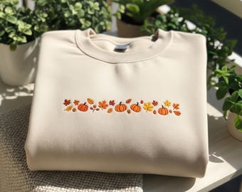 Sweatshirt geborduurde herfstpompoenen: herfstoogst ronde hals