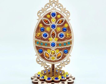 Gouden paaseikraal borduurset, paasdecoratie, houtborduurwerk, paaskraal stikken hout