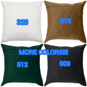 May include: Four different coloured throw pillows with numbers printed on them. The pillows are white, brown, green, and black. The text "MORE COLORS!!!" is printed on the pillows.