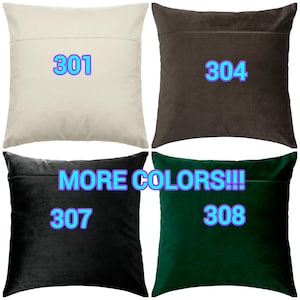 May include: Four square throw pillows in different colours. The pillows are beige, brown, black, and green. The pillows have a seam down the centre and the numbers 301, 304, 307, and 308 are printed on the pillows. The text "MORE COLORS!!!" is printed on the pillows.