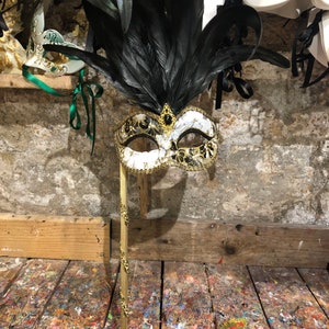 Original Venetian carnival mask with stick hand-decorated by hand