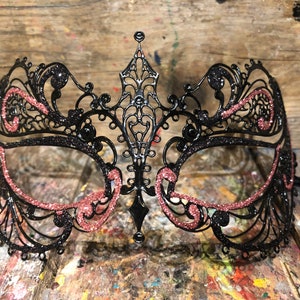 Original Venetian mask for carnival parties made of metal and very light to wear