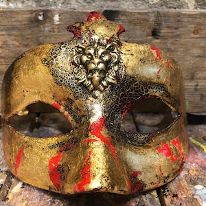 Handcrafted Venetian carnival mask painted by expert local artisans.
