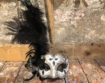 Artisan Venetian mask hand decorated with feather for carnival parties
