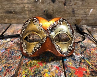 Venetian carnival eye mask made and decorated by hand. Carnival eye mask decorated with golden colors - Ideal for carnival parties