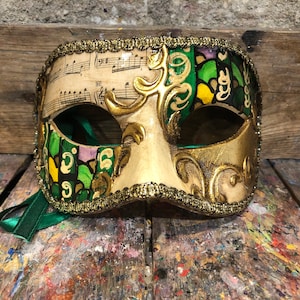 Original Venetian mask for carnival parties hand-decorated by expert craftsmen