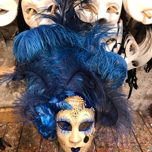 Original Venetian mask hand painted with large feathers and handcrafted blue flowers.