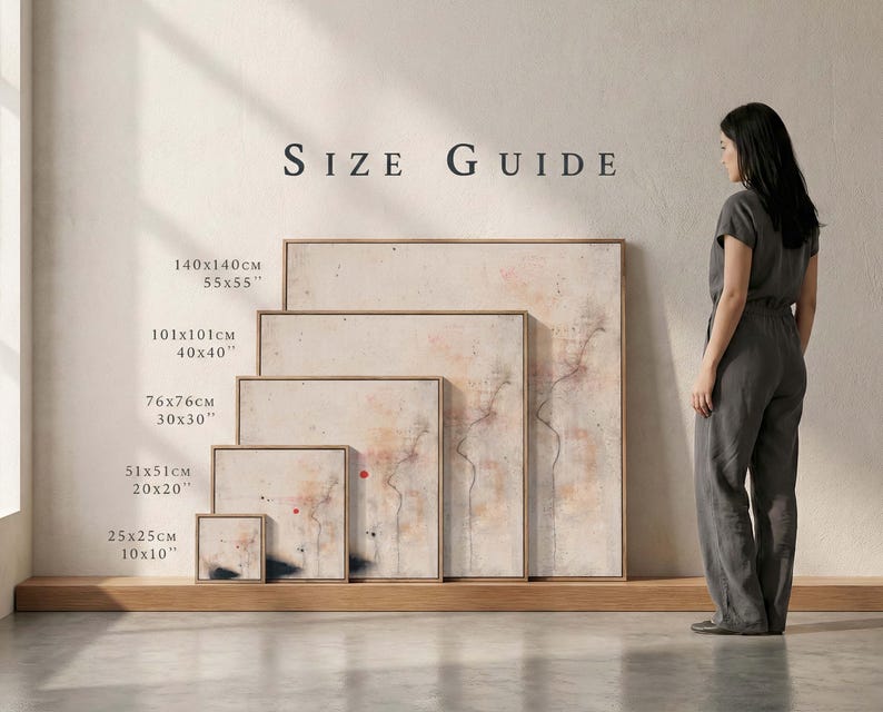 May include: A size guide displays five framed abstract art prints. The prints vary in size, from 10x10 inches to 55x55 inches, with measurements in both inches and centimeters. The artwork features a neutral color palette with red and black accents.