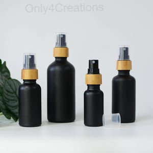 High Quality Natural Fine Mist Spray Bottles Matte Black Glass Natural Bamboo Wood Perfume Spray Bottle 15ml 30ml 50ml 100ml Perfume For Man