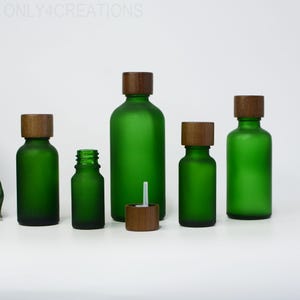5~100ml Natural SPA Oil Bottles Matte Green Glass Black Wood Cap For Body Oil Container Body Lotion Cream Empty For Cosmetic Bulk Order