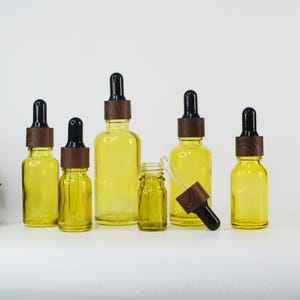 5ML 10ML 15ML 20ML 30ML 50ML 100ML Oliver Green Dropper Bottles Empty For Essential Oil Dark Wooden Grain Cover Skin Care Sets Custom Logo