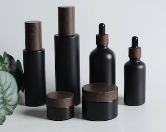 Refillable Matte Black Glass Cosmetic Packaging Set Skincare Packaging Bottle Glass Makeup Bottle Black Bamboo Wooden Printing Lid Wholesale