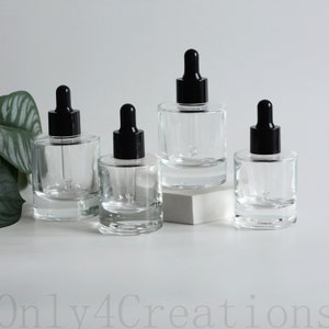 Flacone contagocce per profumo di olio essenziale con suola spessa in vetro trasparente da 30 ml 50 ml Flaconi contagocce riutilizzabili vuoti per imballaggio cosmetico Ordine all'ingrosso