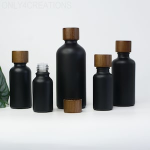 5~100ml Natural SPA Oil Bottles Matte Green Glass Black Wood Cap For Body Oil Container Body Lotion Cream Empty For Cosmetic Bulk Order