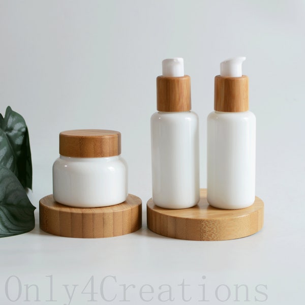 Kosmetische Verpackung Weiße Glaslotionsflaschen / Sahnegläser mit natürlichen Bambusholzdeckeln Make-up-Containerflaschen für den Reisegroßhandel
