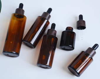 1-200 stuks 20ml 30ml 50ml 60ml 80ml 100ml Glanzend amberkleurig glazen flesje met druppelaar voor huidverzorging, serum en essentiële olie, met zwarte dop met houtnerfstructuur