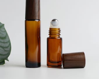 10 ml transparant amberkleurige glazen rollerfles metalen rollerball flessen zwart houten afdrukken roestvrijstalen rollerbal DIY custom logo
